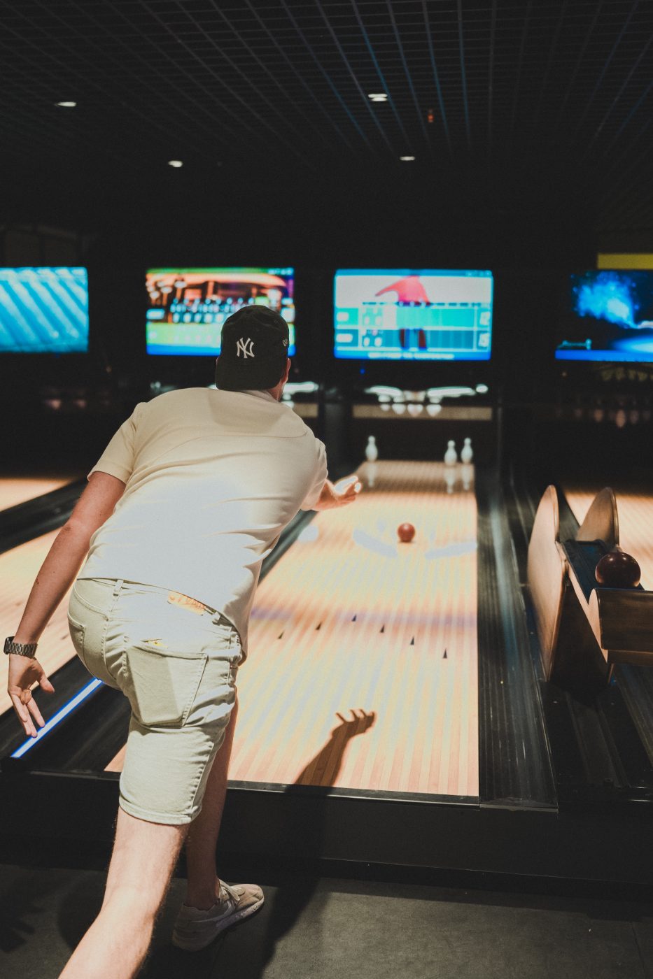 A guest rolling a ball